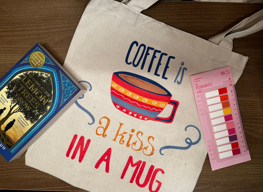 Coffee is a kiss in a mug tote bag